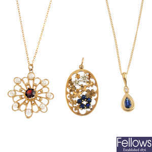 Three 9ct gold gem-set pendants and two chains.