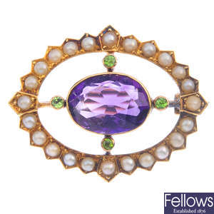 An early 20th century gem-set brooch, in colours commonly associated with the Suffragette movement