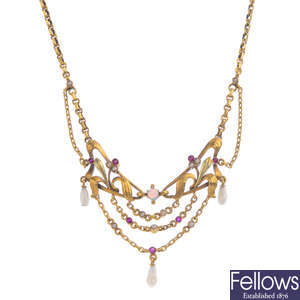 An Art Nouveau 15ct gold gem-set necklace.