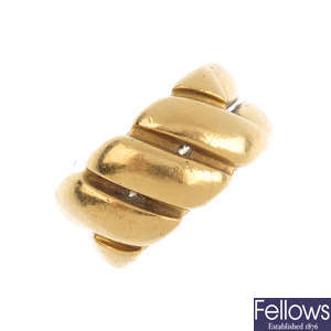 A Victorian 18ct gold crossover band ring, circa 1880.