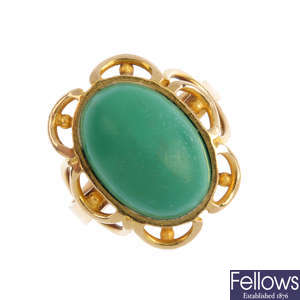 A turquoise single-stone ring.