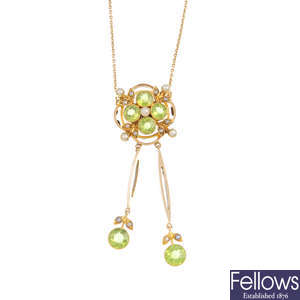An early 20th century gold peridot and split pearl pendant, on chain.