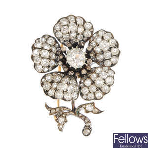 A mid Victorian silver and gold diamond floral brooch.