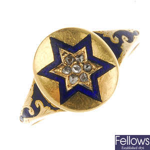 A mid Victorian gold diamond and enamel memorial ring.