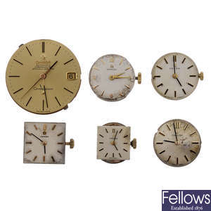 OMEGA - a group of twelve assorted watch movements.