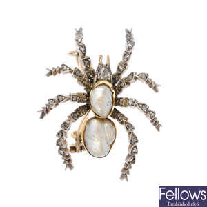 A late Victorian silver and gold, pearl and diamond spider brooch.
