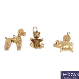 Three 9ct gold charms.