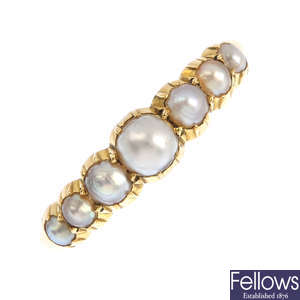 An early 20th century 18ct gold split pearl ring.