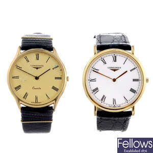 A group of five assorted Longines watches and a watch head.
