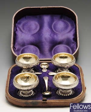 A set of four mid-Victorian silver open salts by George Unite.