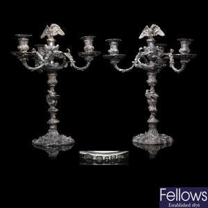An impressive pair of Regency silver four-light candelabra.