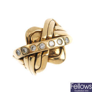A gentleman's 9ct gold diamond puzzle ring.