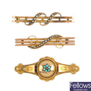Three early 20th century gold gem-set brooches.
