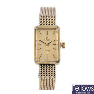 OMEGA - a lady's gold plated De Ville bracelet watch