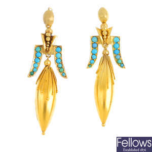 A pair of turquoise earrings.