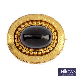 A late Victorian gold garnet brooch.