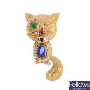 A mid 20th century gem-set novelty cat brooch.