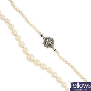 A seed and cultured pearl single-strand necklace, with diamond clasp.