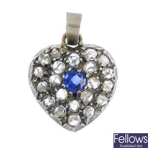 A diamond and sapphire pendant.
