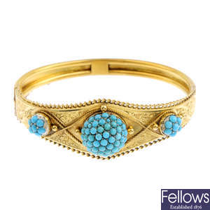 A late Victorian gold turquoise hinged bangle.