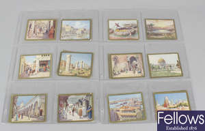 Two boxes containing a collection of assorted cigarette cards