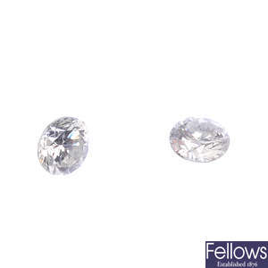 Two brilliant-cut diamonds.