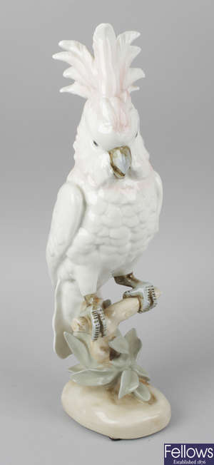 A Royal Dux porcelain figurine modelled as a cockatoo.
