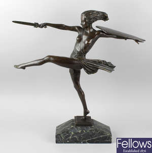A reproduction Art Deco-style bronze figure.