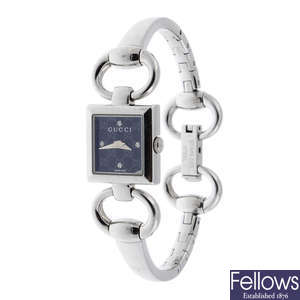 GUCCI - a lady's stainless steel bracelet watch.