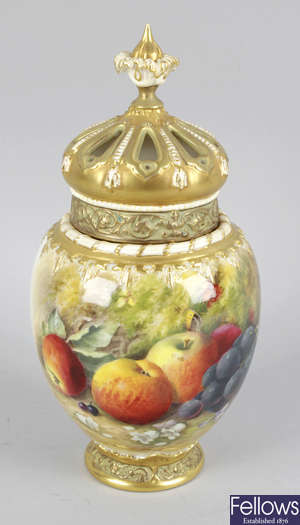 A Royal Worcester bone china potpourri vase and cover.