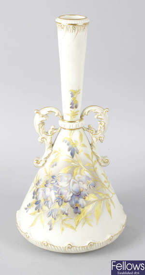 A Royal Worcester bone china twin handled conical shaped vase.