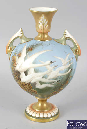 A Royal Worcester bone china vase by Charley Baldwin.
