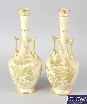 A pair of Royal Worcester bone china vases.