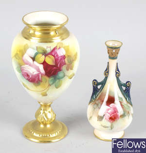 A Royal Worcester bone china vase, together with another Worcester vase.