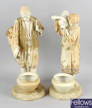 A pair of impressive large Royal Worcester James Hadley bone china figures.