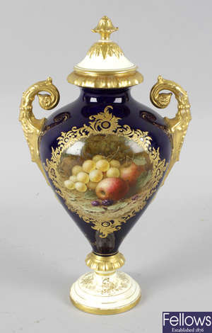 A Coalport bone china twin handled vase and cover.