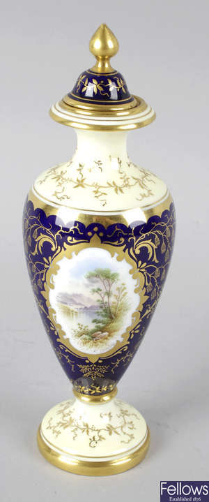 A Coalport bone china vase and cover.