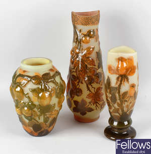 A reproduction Galle cameo style glass vase decorated with roses, another similar example decorated with fruits, etc.
