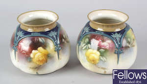 A pair of Hadleyâ€™s Worcester bone china squat bulbous vases.