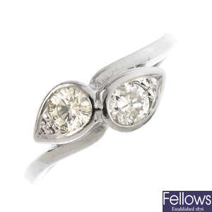 A platinum diamond two-stone ring.