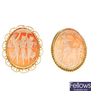 Two oval cameo brooches.