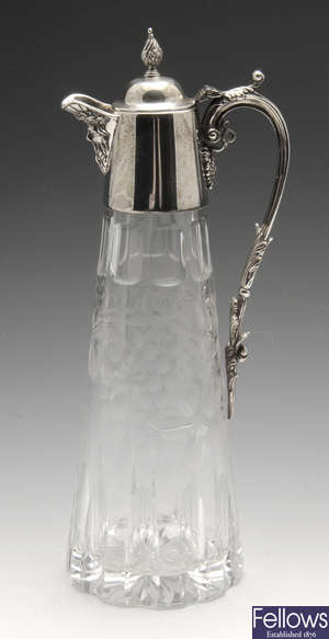 A modern silver mounted glass claret jug.