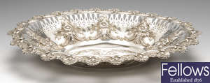 An early 20th century embossed silver bread basket.