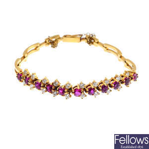 A gold ruby and diamond bracelet.