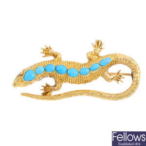 A mid Victorian gold turquoise lizard brooch.