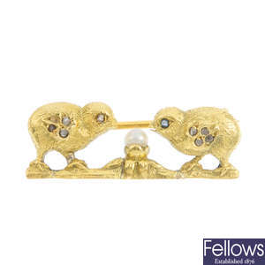 A late Victorian gold gem-set novelty chick brooch.