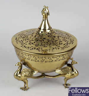 A brass Eastern incense burner and cover.