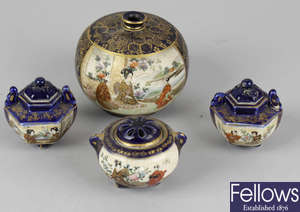 A group of miniature Japanese Satsuma pottery.