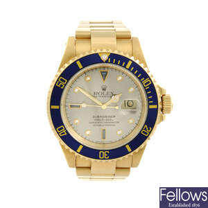 ROLEX - a gentleman's 18ct yellow gold Oyster Perpetual Date Submariner bracelet watch.