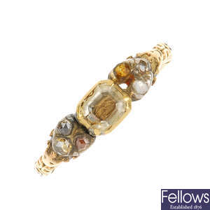 A George II gold rock crystal and diamond memorial ring.